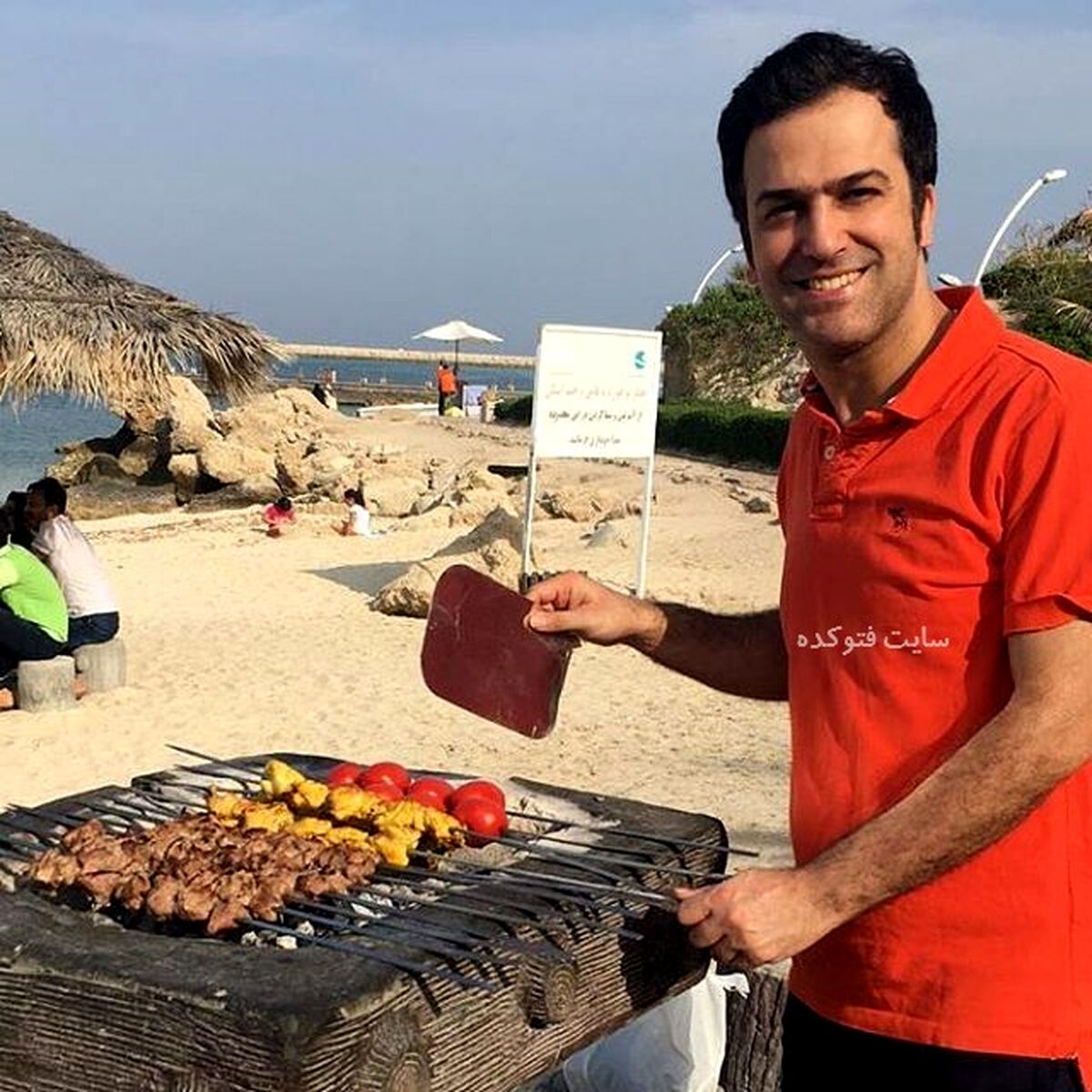 عکس لورفته از حامد آهنگی و همسرش در شهربازی